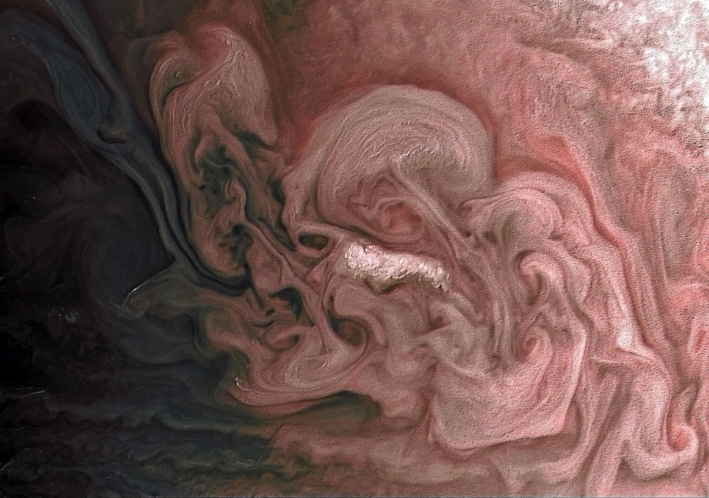 Momento em que tempestade é registrada pela sonda Juno (Foto: Nasa)