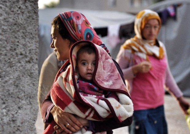 Refugiados deixam a Síria por conta da guerra civil (Foto: Kutluhan Cucel/Getty Images)