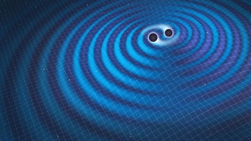 As ondas gravitacionais viajam pelo espaço-tempo como as ondas em um lago (Foto: Getty Images via BBC News)
