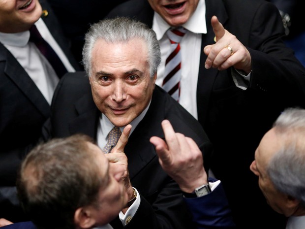 Michel Temer (c) é empossado presidente da República em cerimônia realizada noCongresso Nacional, em Brasília, nesta quarta-feira, 31, após a cassação de Dilma Rousseff   com a aprovação de 61 senadores.  (Foto: Ueslei Marcelino/Reuters)