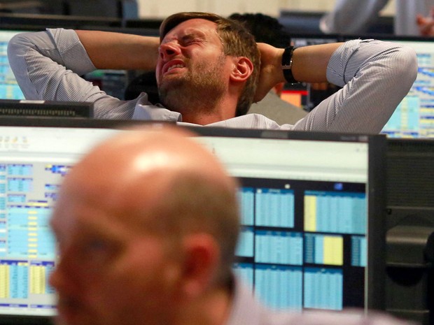 Reação em uma empresa de corretagem no centro financeiro de Londres depois da Grã Bretanha ter decidido sair do Reino Unido (Foto: Russell Boyce/ Reuters)