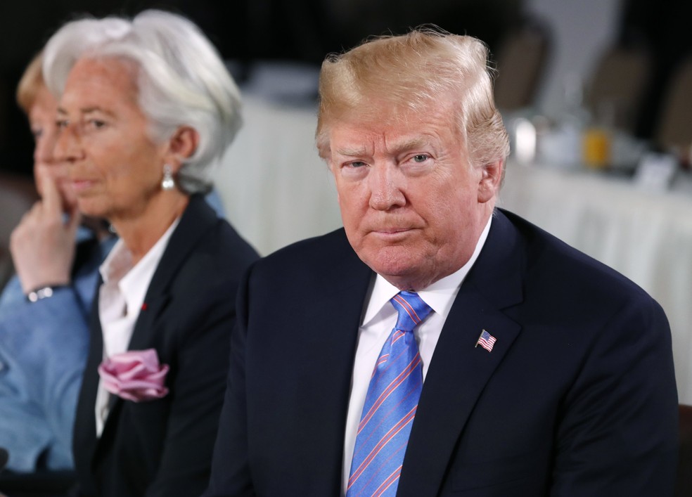 O presidente dos EUA, Donald Trump, e a diretora-gerente do Fundo Monetário Internacional, Christine Lagarde, participam da cúpula do G7 em Quebec, no Canadá (Foto: REUTERS / Yves Herman)