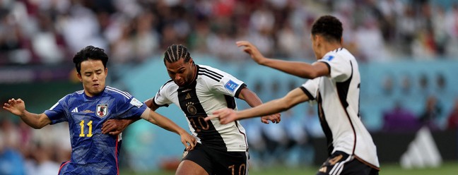 Alemanha e Japão se enfrentam no Estádio Internacional Khalifa, em Doha, em 23 de novembro de 2022.  — Foto: Adrian DENNIS / AFP