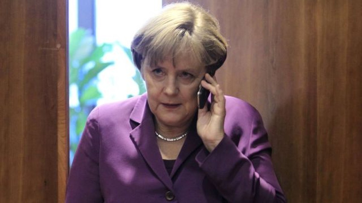 How would Denmark help the United States spy on Angela Merkel and other European leaders a scientist