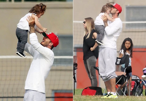 Nem Beckham resiste aos encantos da garotinha  (Foto: .)