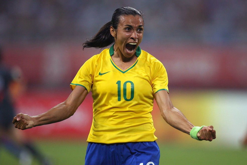 Marta comemora um gol nos Jogos Olímpicos de Pequim-2008 — Foto: AFP