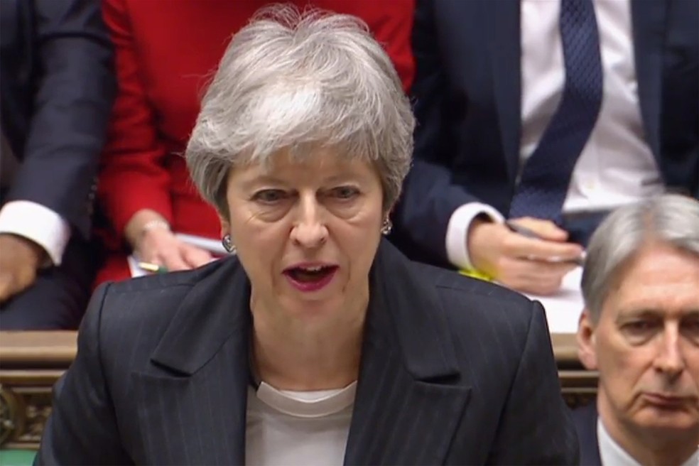 Theresa May discursa no parlamento nesta quarta-feira (20) — Foto: HO/AFP/PRU