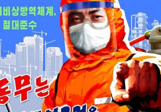 Pôster norte-coreano pergunta: 'camarada, você está seguindo as normas emergenciais de prevenção contra o vírus?' (Foto: KOREAN CENTRAL TELEVISION)