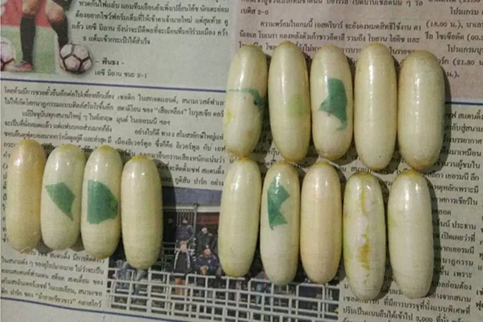 Cápsulas de cocaína transportadas pelos brasileiros presos na Tailândia (Foto: Reprodução/Narcotics Suppression Bureau)