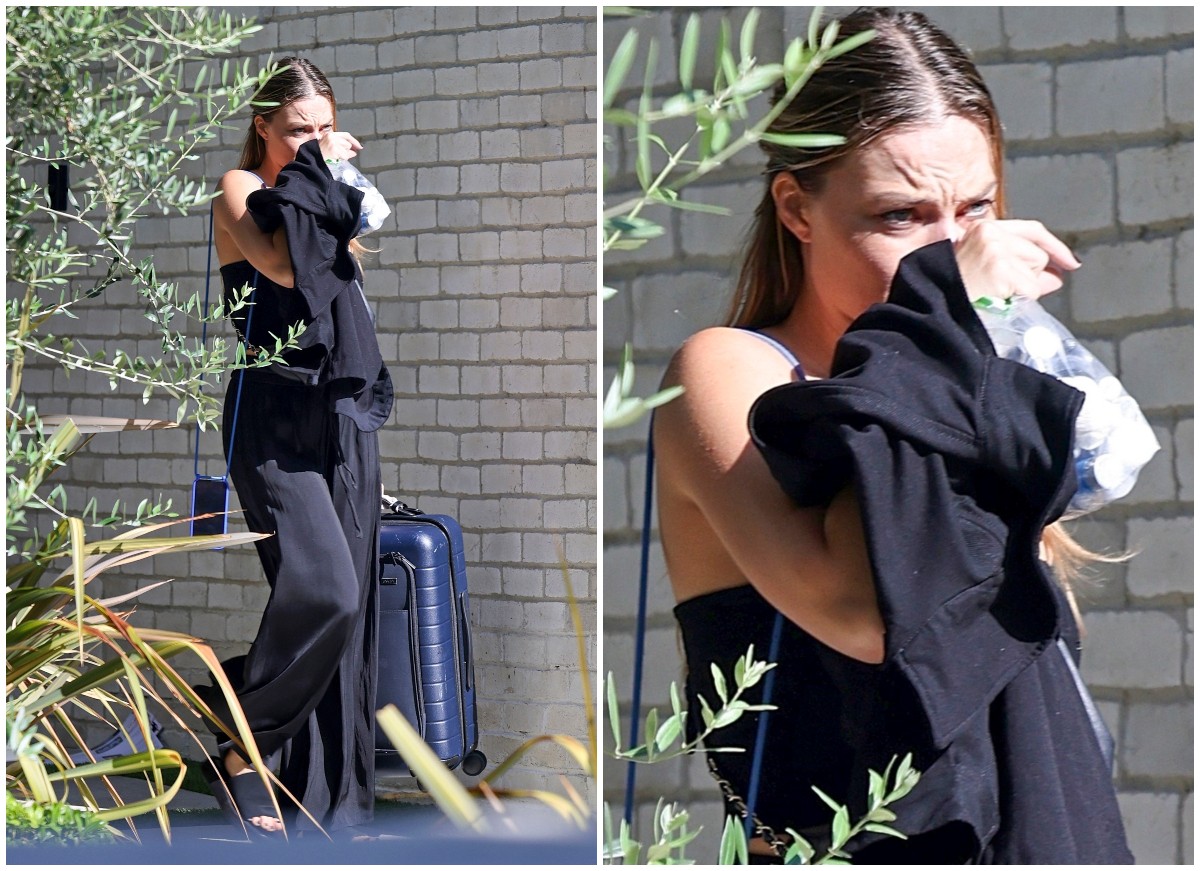 Margot Robbie chora ao deixar mansão de Cara Delevingne (Foto: The Grosby Group)