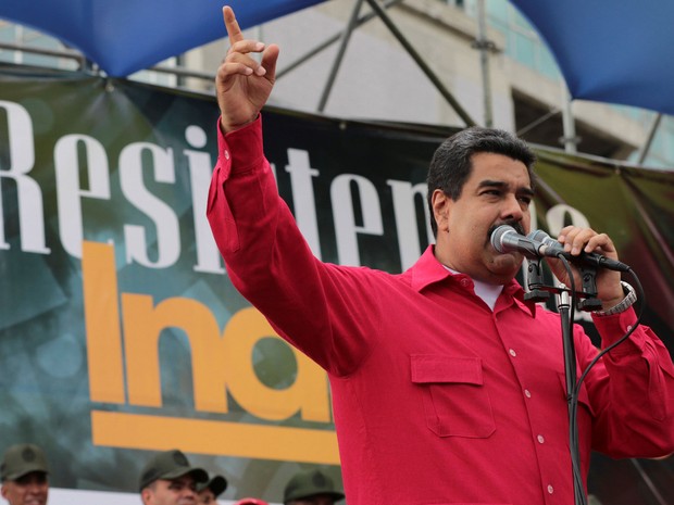 O presidente da Venezuela, Nicolás Maduro, discursa no Dia Nacional da Resistência Indígena, em Caracas, na quarta (12) (Foto: O presidente da Venezuela, Nicolás Maduro, discursa no Dia Nacional da Resistência Indígena, em Caracas, na quarta (12) Miraflores Palace/Handout via Reuters)