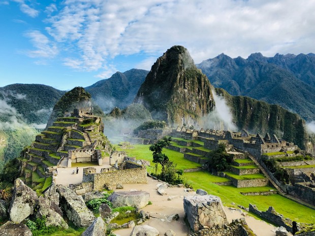 The Inca citadel of Machu Picchu in the early morning light with Huayna Picchu mountain in the background (Foto: Getty Images)