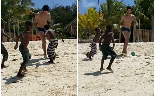 Alexandre Pato joga bola com crianças em praia fora do Brasil