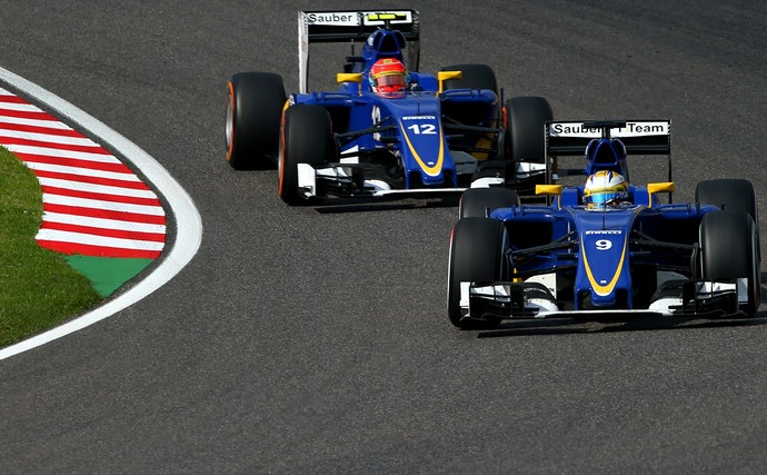 Felipe Nasr e Marcus Ericsson no GP do Japão de 2015 (Foto: Getty Images)