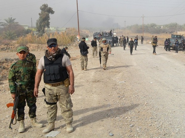 Tropas iraquianas durante as operações de reconquista da cidade de Dijalah, no Iraque (Foto: AFP)