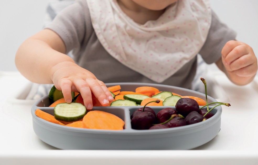 O ambiente em que os filhos se alimentam também tem grande importância para a refeição ser bem-sucedida — Foto: Getty Images