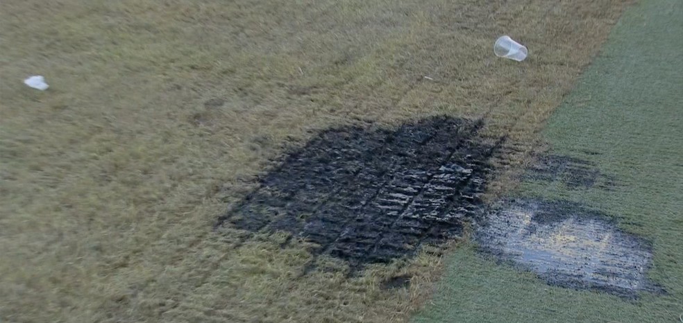 Gramado da Arena Pantanal ficou danificado após festa rave no estádio (Foto: TVCA/Reprodução)