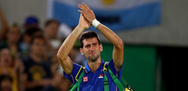 Djokovic chora após ser eliminado no Rio (Foto: Clive Brunskill/Getty Images)