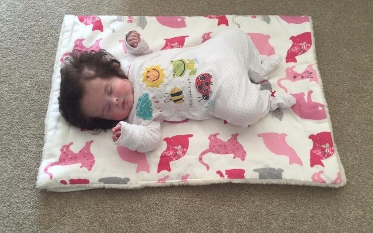 A cabeleira de Millie aos 4 meses de idade
