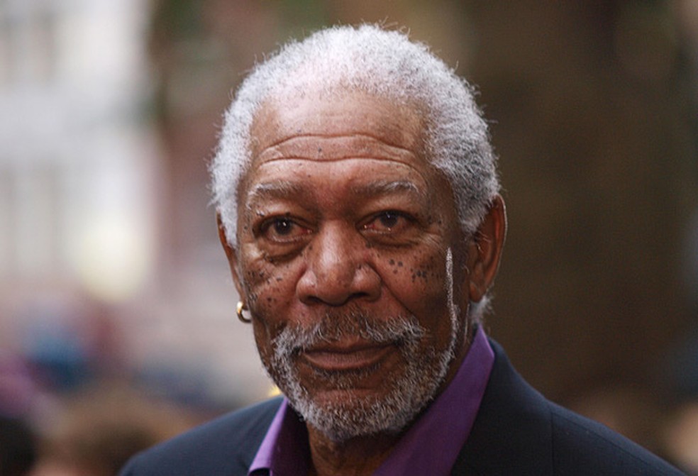 O ator Morgan Freeman nesta quarta-feira (18), em Paris, no lançamento do novo 'Batman' (Foto: AFP)