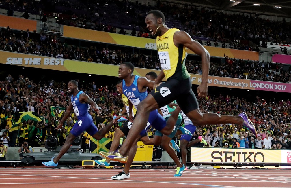 Gatlin cruza à frente de Bolt, que leva o bronze; Coleman é prata (Foto: Reuters)