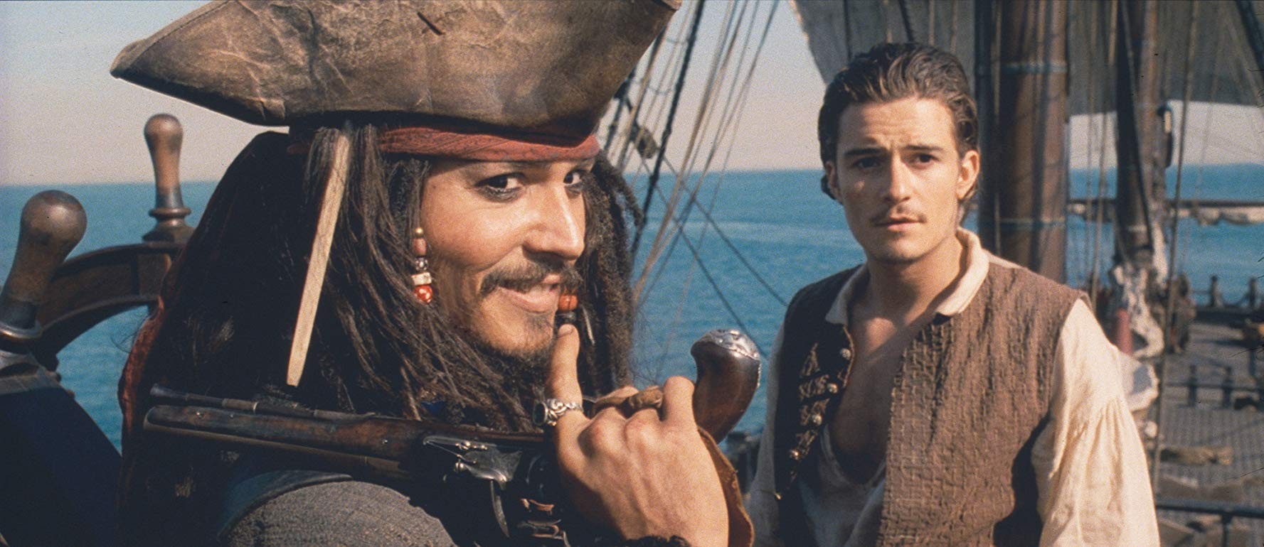 Johnny Depp e Orlando Bloom em Piratas do Caribe: A  Maldição do Pérola Negra   (2003) (Foto: Divulgação)
