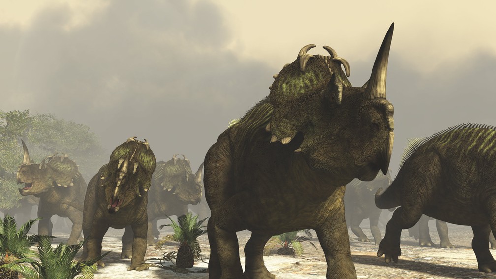 Ilustração mostra um grupo de Centrosaurus, um dinossauro de até 6 metros de comprimento que viveu no Canadá há 75 milhões de anos — Foto: Raul Lunia/Leemage via AFP