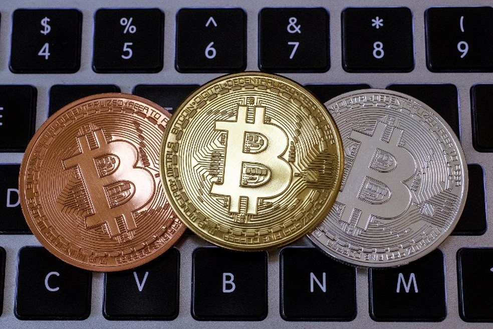 Hackers invadiram Portais da Transparência no interior de Alagoas e instalaram código que podia transformar computadores em mineradoras de bitcoin; problema foi resolvido assim que foi percebido, garante responsável — Foto: Jack Guez/AFP