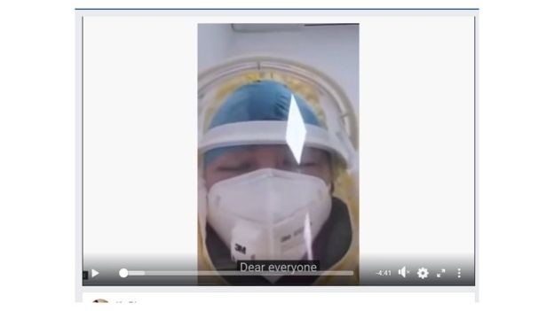 Traje e máscara de suposta médica em vídeo viral não são os mesmos usados ​​pela equipe médica em Hubei (Foto: Reprodução/ via BBC News)