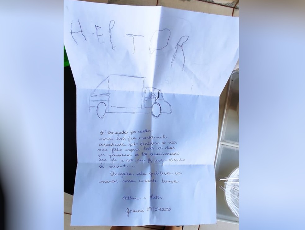 Criança escreve carta e entrega para coletores de lixo em agradecimento por manterem limpa a cidade de Goianira — Foto: Arquivo Pessoal/Pablina Soares