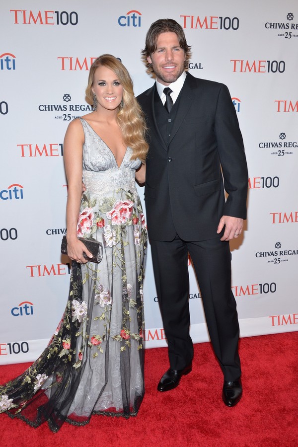 A cantora Carrie Underwood e seu marido, o jogador de hockey Mikey Fisher (Foto: Getty Images)