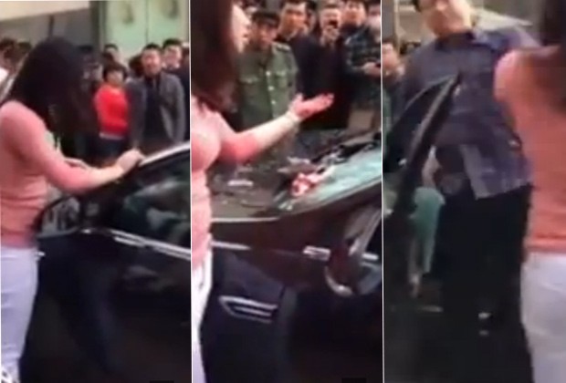 Gravação mostra mulher usando tijolo para quebrar vidros de carro antes de agredir o marido (Foto: Reprodução / YouTube)