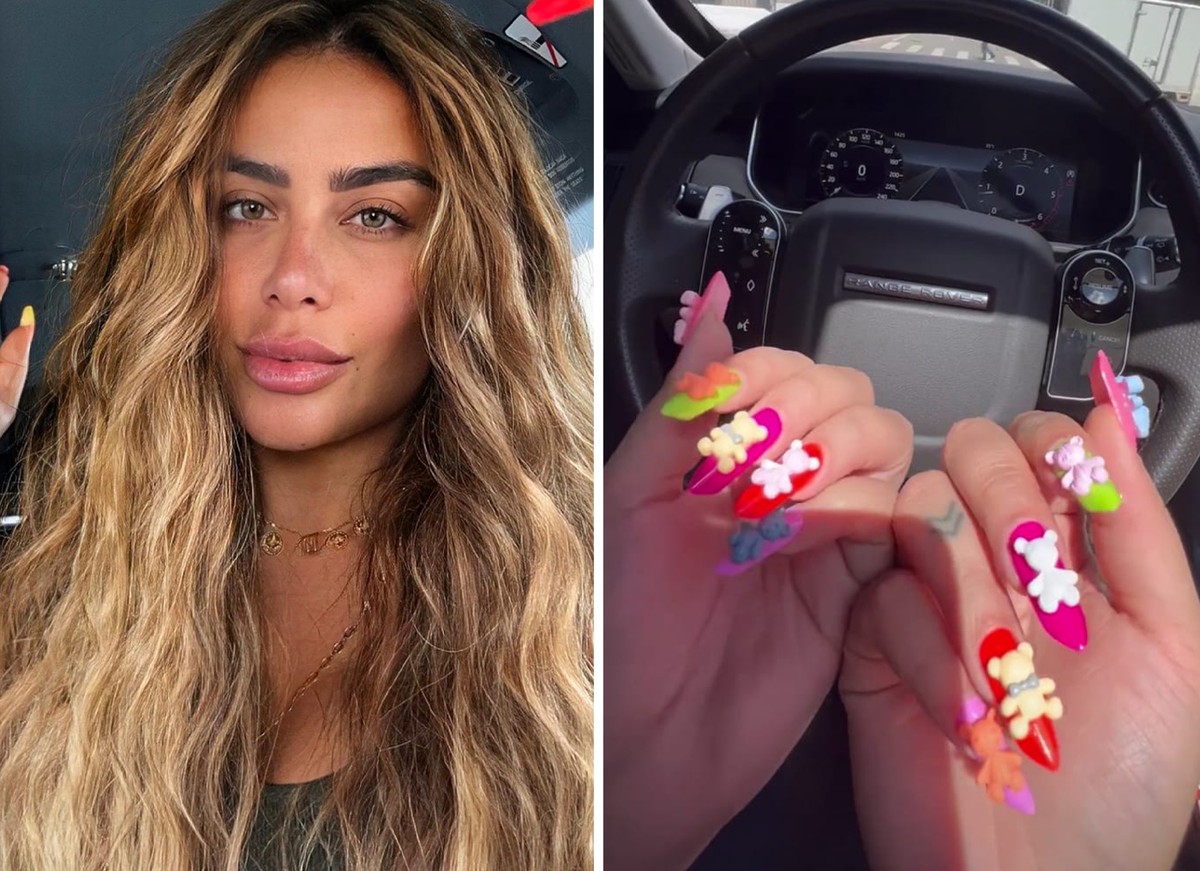 mulher com unhas com 'ursinhos' colados 
