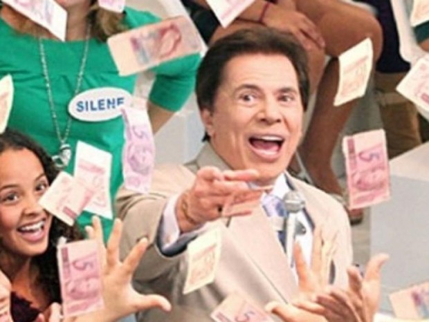 Silvio Santos atira notas com seu clássico bordão ´quem quer dinheiro?´ (Foto: Divulgação)