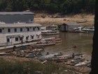 Seca dos rios em Manaus revela lixo e degradação ambiental em marina