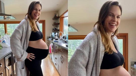Grávida de gêmeos, Hilary Swank mostra o barrigão: "Começando a crescer"