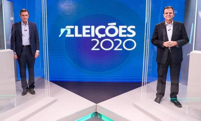 Crivella e Paes no estúdio da TV Globo durante debate que antecedeu a eleição, em novembro