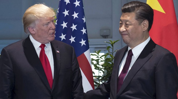 Os presidentes dos Estados Unidos, Donald Trump, e da China, Xi Jinping, em encontro bilateral do G20 em julho deste ano (Foto: Estadão Conteúdo)