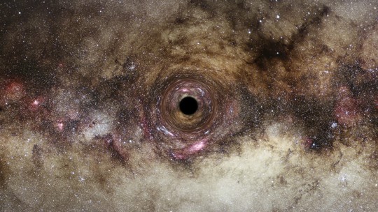 Gravidade que dobra a luz revela um dos maiores buracos negros já vistos