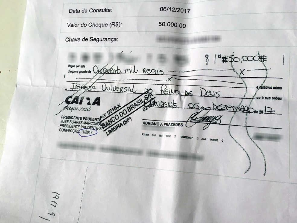 Cópia do cheque foi anexada ao Boletim de Ocorrência registrado na Polícia Civil (Foto: Valmir Custódio/G1)