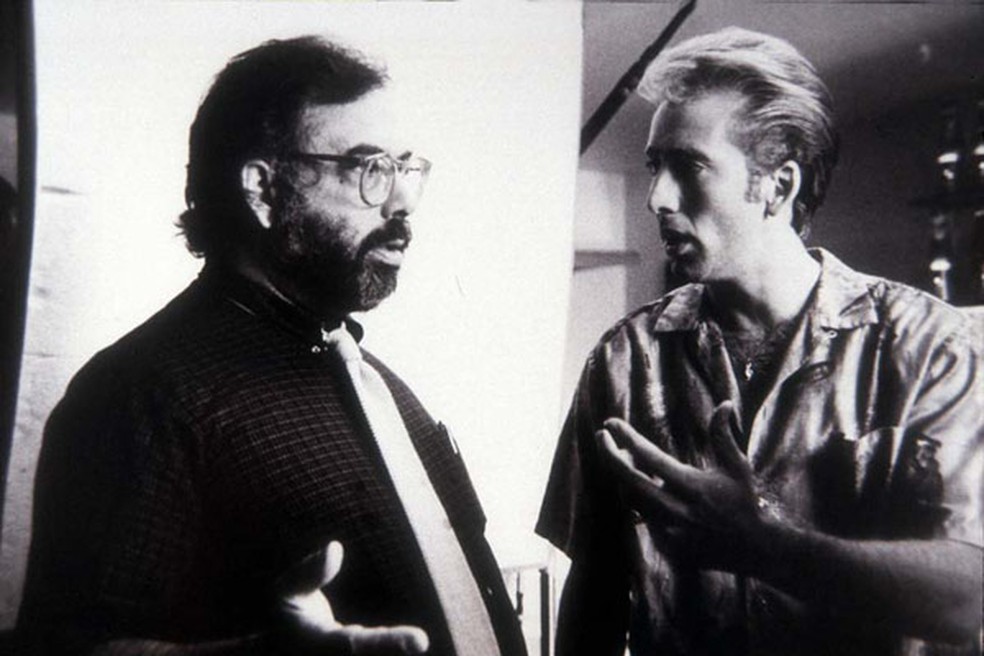 Francis Ford Coppola e Nicolas Cage em 'Peggy Sue, seu passado à espera' (1986) — Foto: Reprodução