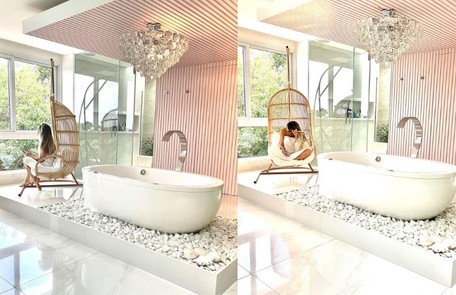 Banheiro envidraçado com balanço e banheira. Na foto, Maíra Cardi Reprodução