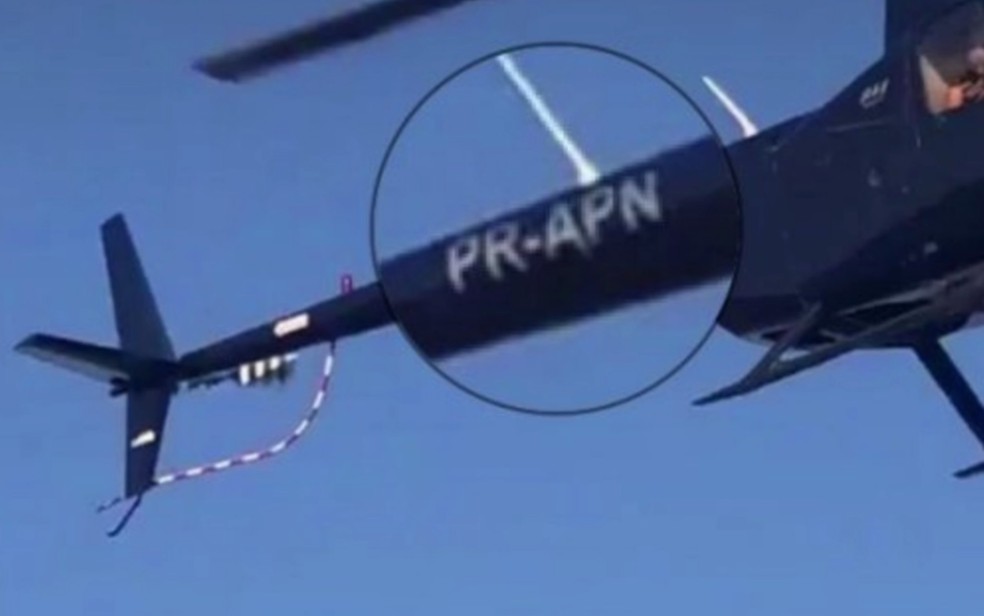 Prefixo de helicóptero que caiu no Lago das Brisas é registrado em vídeo de manobras arriscadas — Foto: Reprodução/TV Anhanguera