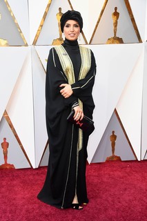 Turbante pra lá de fashion no look de Fatma Al Remaihi, CEO do Instituto de Cinema de Doha