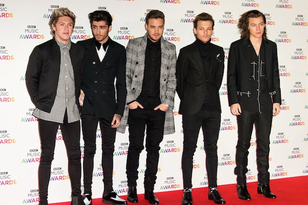 O cantor Zayn Malik junto com seus colegas de One Direction em foto de 2014 (Foto: Getty Images)