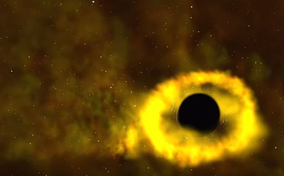 Ilustração da Nasa mostra o momento em que estrela é "devorada" por buraco negro. O aro iluminado é composto por gases — Foto: Reprodução/Nasa