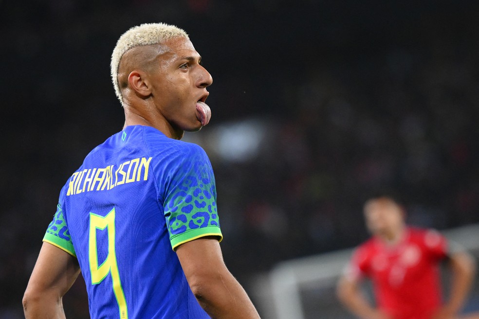 Richarlison vibra após marcar em Brasil x Tunísia — Foto: Anne-Christine POUJOULAT / AFP