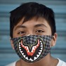 Foto: (Homem usando uma máscara facial posa para foto na Cidade do México / Alfredo Estrella/AFP)