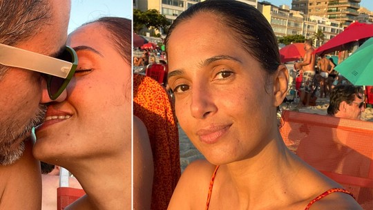 Camila Pitanga troca beijos com o namorado em dia de praia