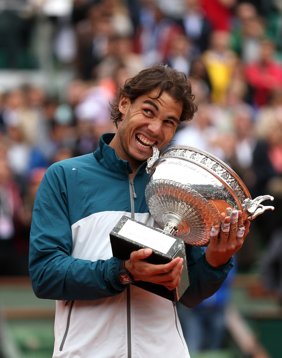 2013 - Nadal faz uma final espanhola contra David Ferrer e fatura o octocampeonato na França — Foto: Getty Images 